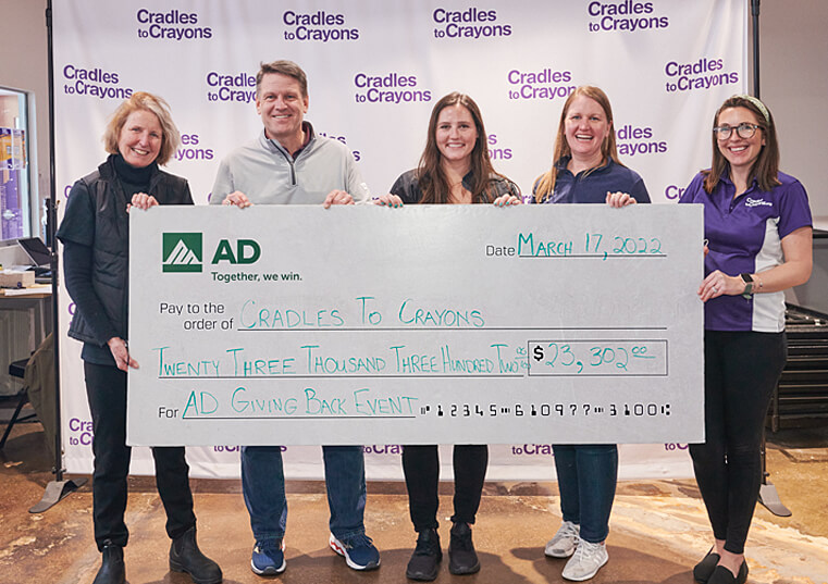 AD presents check to C2C