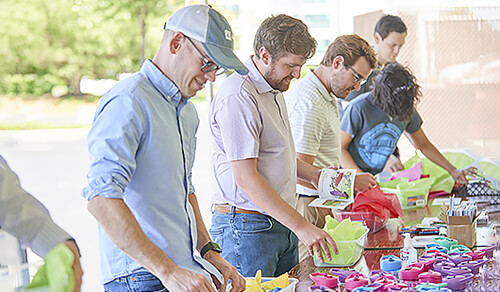 AD associates build, donate over 1,000 boxes of toys and activities for hospitalized children and families